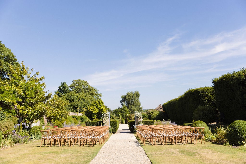 a summer pastel wedding ceremony set up