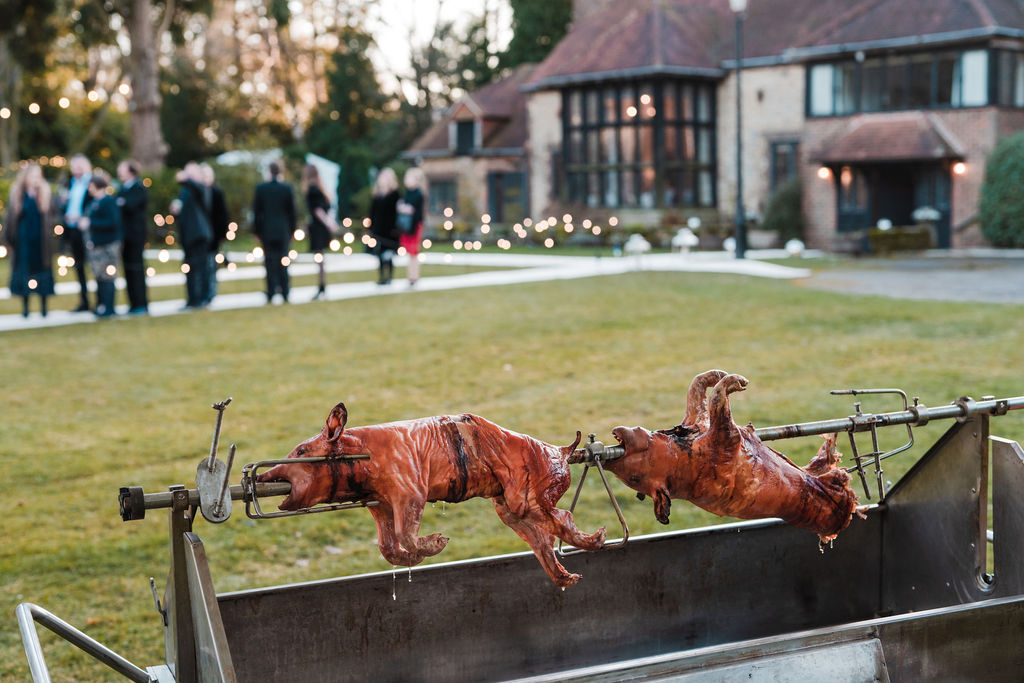 Hog roast at a short notice winter marquee wedding planned at couple's home by Ella Hartig