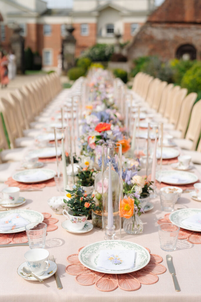 An elevated tea party tablescape with summer florals for a short notice wedding planned at Four Seasons Hampshire by Ella Hartig