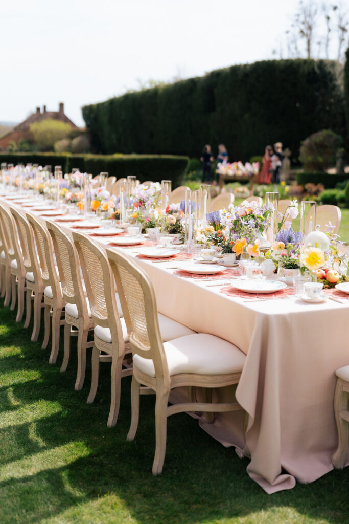 A pastel florals and fruit outdoor afternoon tea for a short notice wedding planned at Four Seasons Hampshire by Ella Hartig