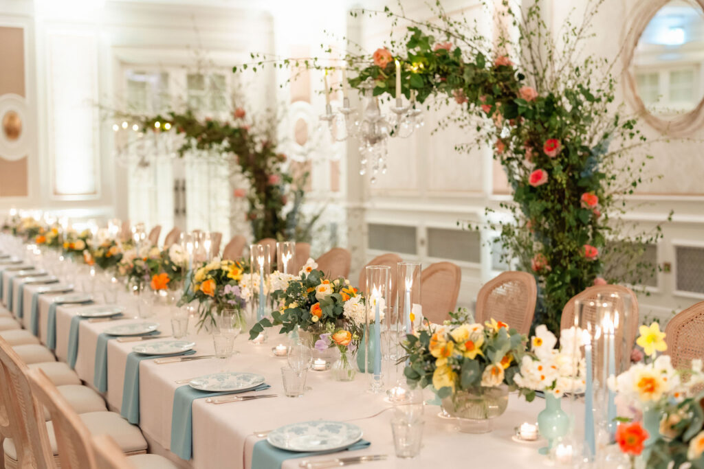 A garden party with summer florals for a short notice wedding planned at Four Seasons Hampshire by Ella Hartig