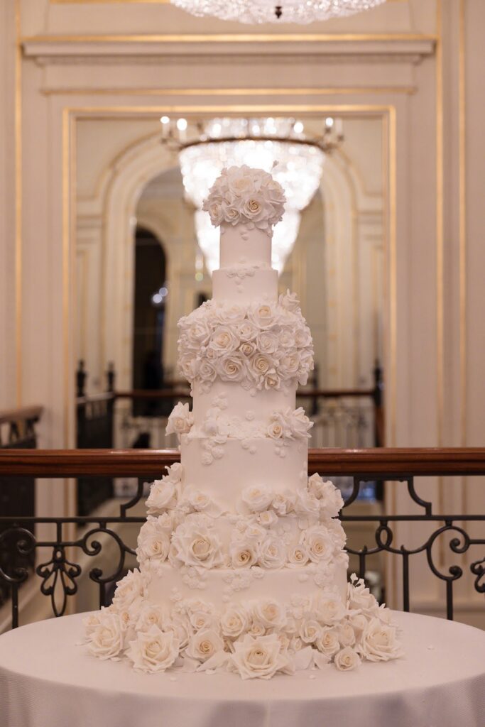 A four tier floral wedding cake, for a short notice wedding planned at Mandarin Oriental by Ella Hartig